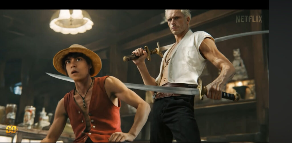 a man holding a sword and another man standing next to him